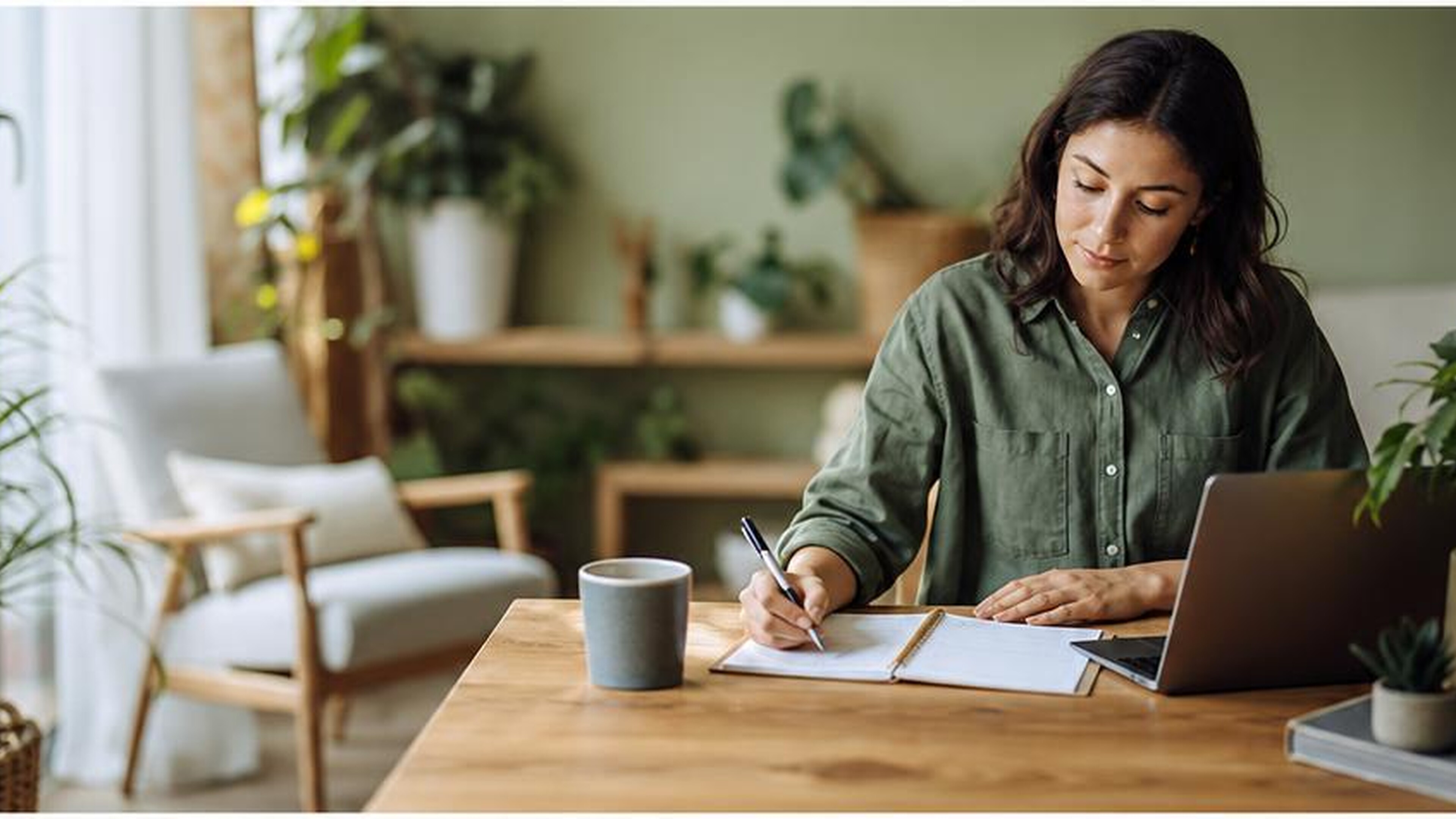 An adult writing in a planner at a desk in natural light, illustrating organization and attention. Generated illustration, not an actual patient.